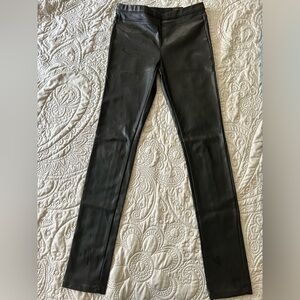 Blank NYC black vegan leather-look leggings. 12. Hidden elastic waistband. Nice!